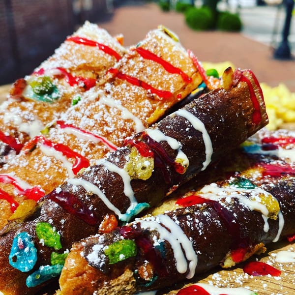 B-UNOS' French toast and crepes, drizzled with colorful sauces and powdered sugar.
